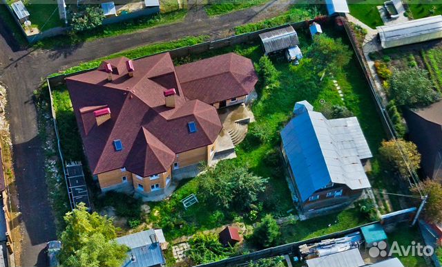 Коттедж 450 м² на участке 14 сот.