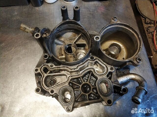 Кронштейн масляного фильтра 3.0 VW Туарег Audi Q7