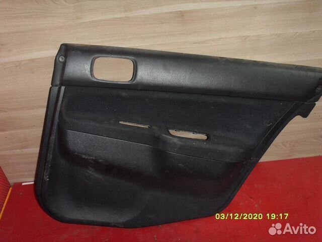 Обшивка задней двери MR444252 Mitsubishi Lancer 9