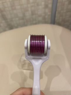 Роликовый массажер для лица